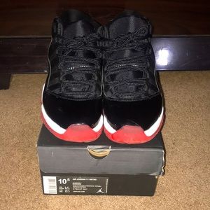 Air Jordan bred 11 retro, size 10.5, worn 5 times.